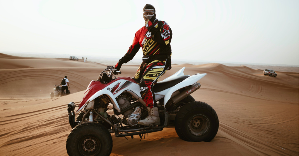 Dubai Quad Bike Tour with Sandboarding: Desert Adventure